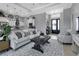 Open concept living area with modern decor and a view of the kitchen at 9978 Audrey St, Port Charlotte, FL 33981