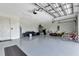 Spacious garage with epoxy flooring and ample storage at 9978 Audrey St, Port Charlotte, FL 33981