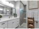 Modern bathroom with white vanity and walk-in shower at 9978 Audrey St, Port Charlotte, FL 33981