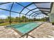 Enjoy this refreshing pool and screened enclosure at 9978 Audrey St, Port Charlotte, FL 33981