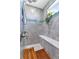 Elegant shower with built-in bench and pebble floor at 9978 Audrey St, Port Charlotte, FL 33981
