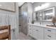 Elegant bathroom featuring a walk-in shower and modern vanity at 9978 Audrey St, Port Charlotte, FL 33981