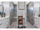 Spa-like bathroom with walk-in shower and double vanity at 9978 Audrey St, Port Charlotte, FL 33981