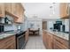 Well-equipped kitchen with modern appliances, granite countertops, and easy access to the dining area at 22062 Marshall Ave, Port Charlotte, FL 33952