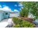 A patio and landscaped backyard at 22062 Marshall Ave, Port Charlotte, FL 33952