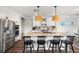 Modern kitchen with large island and stainless steel appliances at 43789 Cattleman Dr, Punta Gorda, FL 33982