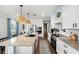 Spacious kitchen featuring granite countertops, stainless steel appliances, and an island at 43789 Cattleman Dr, Punta Gorda, FL 33982