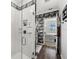 Clean bathroom with a walk-in shower, modern fixtures, and stylish decor at 43789 Cattleman Dr, Punta Gorda, FL 33982
