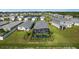 Aerial view of a house with a private pool at 43789 Cattleman Dr, Punta Gorda, FL 33982