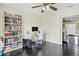 Bright home office with built-in shelving and hardwood floors at 2309 Conway Blvd, Port Charlotte, FL 33952