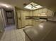 Bright kitchen features updated countertops and appliances at 1515 Forrest Nelson Blvd # E106, Port Charlotte, FL 33952