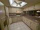 Bright kitchen features updated countertops and appliances at 1515 Forrest Nelson Blvd # E106, Port Charlotte, FL 33952