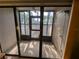 Bright and airy screened patio with view of tropical landscape at 1515 Forrest Nelson Blvd # E106, Port Charlotte, FL 33952