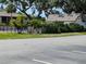 Community pool area with surrounding buildings and trees at 1515 Forrest Nelson Blvd # E106, Port Charlotte, FL 33952
