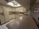 Bright kitchen features updated countertops and appliances at 1515 Forrest Nelson Blvd # E106, Port Charlotte, FL 33952
