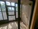 Bright enclosed Florida room with access to exterior at 1515 Forrest Nelson Blvd # E106, Port Charlotte, FL 33952