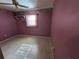 Bedroom with tiled floor and ceiling fan at 1515 Forrest Nelson Blvd # E106, Port Charlotte, FL 33952