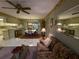View of living room, dining area, and kitchen at 1515 Forrest Nelson Blvd # E106, Port Charlotte, FL 33952