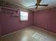 Bedroom with tiled floor and ceiling fan at 1515 Forrest Nelson Blvd # E106, Port Charlotte, FL 33952