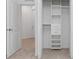 Bedroom closet with shelving and double hanging rods at 14121 Heritage Landing Blvd # 731, Punta Gorda, FL 33955