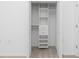 White closet with shelves, drawers, and hanging space at 14121 Heritage Landing Blvd # 731, Punta Gorda, FL 33955