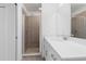 Bathroom with walk-in shower and white vanity at 14121 Heritage Landing Blvd # 731, Punta Gorda, FL 33955