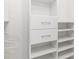Spacious walk-in closet with shelves and drawers at 14121 Heritage Landing Blvd # 731, Punta Gorda, FL 33955