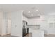 Open concept kitchen with white cabinets and stainless steel appliances at 14121 Heritage Landing Blvd # 731, Punta Gorda, FL 33955