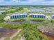 Modern condo community near golf course with scenic water views and lush landscaping at 14121 Heritage Landing Blvd # 731, Punta Gorda, FL 33955