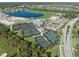 Community features tennis courts, pickleball courts, and a resort-style pool at 14121 Heritage Landing Blvd # 731, Punta Gorda, FL 33955