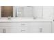 Double sink bathroom with large mirror and shower at 14121 Heritage Landing Blvd # 731, Punta Gorda, FL 33955