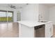 Modern kitchen with stainless steel appliances and white cabinetry at 14121 Heritage Landing Blvd # 731, Punta Gorda, FL 33955