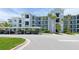 Condo building with covered parking and attractive landscaping at 14121 Heritage Landing Blvd # 731, Punta Gorda, FL 33955