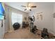 Home gym with elliptical, weights, and exercise mat at 27441 Natal Dr, Punta Gorda, FL 33983