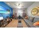 Fun recreation room with a large TV and comfy seating at 27441 Natal Dr, Punta Gorda, FL 33983