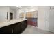 Double vanity bathroom with shower and modern fixtures at 27441 Natal Dr, Punta Gorda, FL 33983