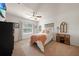 Charming bedroom with a full-size bed and plenty of natural light at 27441 Natal Dr, Punta Gorda, FL 33983