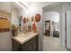 Well-appointed bathroom with single sink and decorative accents at 27441 Natal Dr, Punta Gorda, FL 33983