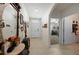 Bright and airy entryway with tile flooring and access to other rooms at 27441 Natal Dr, Punta Gorda, FL 33983