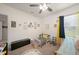 bedroom with twin bed, toy storage, and decor at 27441 Natal Dr, Punta Gorda, FL 33983