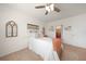 Cozy bedroom with a full-size bed and decorative wall hangings at 27441 Natal Dr, Punta Gorda, FL 33983