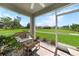 Spacious screened porch with backyard views at 27441 Natal Dr, Punta Gorda, FL 33983