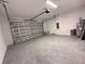 Large garage with sealed flooring, water heater, and ample space at 26345 Trinilas Dr, Punta Gorda, FL 33983
