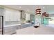 Modern kitchen with stainless steel appliances and an island at 28976 Gin Ln, Punta Gorda, FL 33982