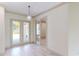 Bright foyer with light wood flooring and access to interior rooms at 28976 Gin Ln, Punta Gorda, FL 33982