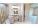 Vanity with granite countertop and gray cabinets at 28976 Gin Ln, Punta Gorda, FL 33982