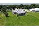 Aerial view of home with large backyard at 28976 Gin Ln, Punta Gorda, FL 33982
