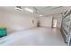 Large garage offering epoxy flooring and extra storage at 28976 Gin Ln, Punta Gorda, FL 33982