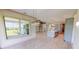 Bright dining room with wood flooring and large window at 28976 Gin Ln, Punta Gorda, FL 33982
