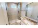 Bathroom with shower, toilet and vanity at 28976 Gin Ln, Punta Gorda, FL 33982